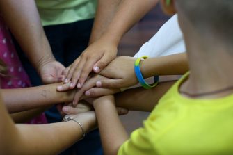 close up of hands inside a circle