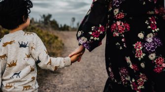 Eli Ben holding hands