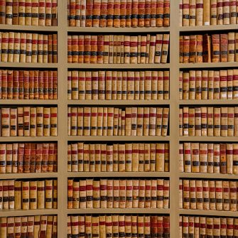 Books on shelves in the Law Library of the Old Mississippi State Capitol building (1839) at 100 S State Street in Jackson, Mississippi on January 14, 2014. This photograph consists of three exposures blended together to create a high dynamic range (HDR) image.