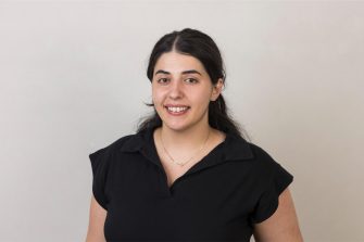 A professional portrait of Chloe Hicks, a PhD student at the Advanced Energy Research Institute (AERI), Hudson.