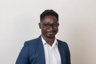 Headshot photograph of Isaac Kyei-Barffour, a PhD student at AERI, University of Queensland, with a focus on models.