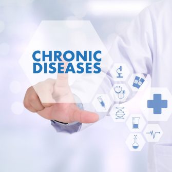 Image of doctor touching "Chronic Diseases" on an imaginary digital panel