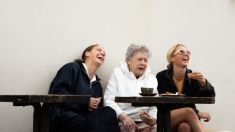 Adelaide and Lucinda Miller with their Nana having coffee