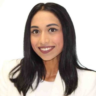 A professional headshot of Dr Akshara Shyamsunder