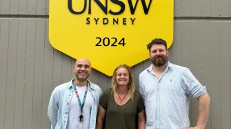 Blake Cochran and team in front of UNSW sign