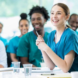 Attentive nursing students in class stock photo