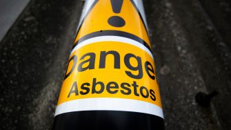 Abstract picture of asbestos warning sign