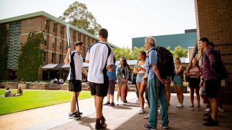 Photograph of incomig studenta socialing at orientation week