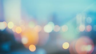 abstract background with defocused lights and shadow from cityscape at night