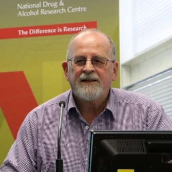 Wayne Hall presenting a NDARC seminar