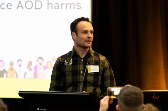 Peter Gates speaking at the 2024 NDARC Annual Research Symposium