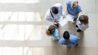 Researchers standing in a circle