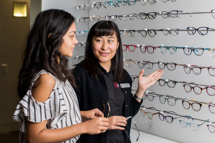 Photograph of women browsing for glasses