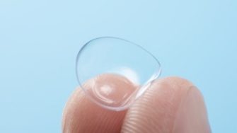 contact lens on finger