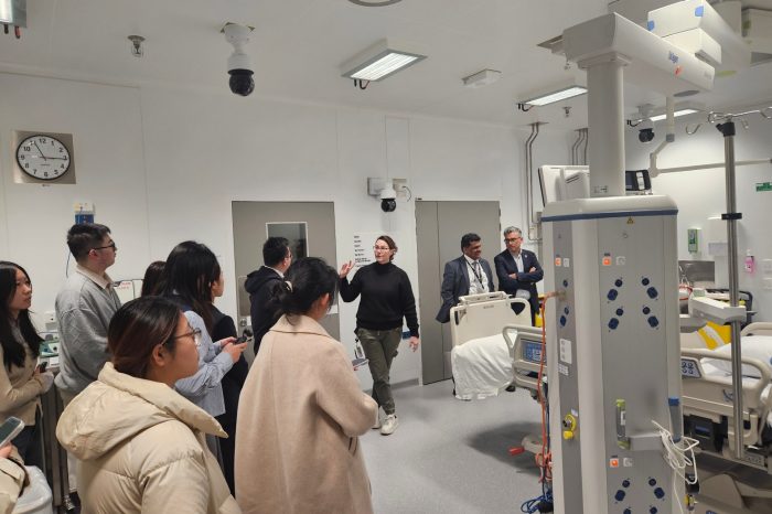 The team from HUST have a tour of a hospital room in Westmead