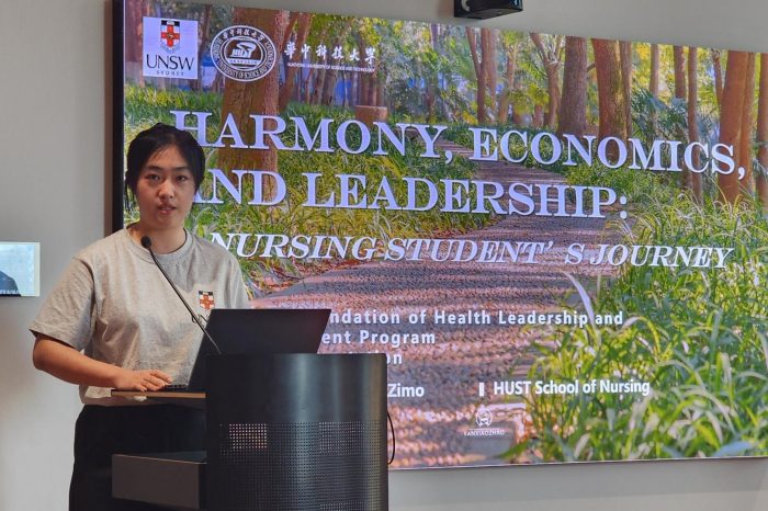 A participant in the HUST visit presents on their experience