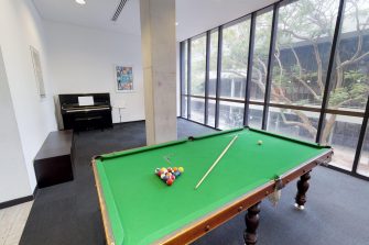 common room pool table, games, piano