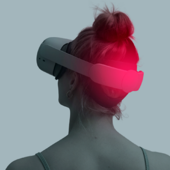 a woman tilts her head up while wearing a virtual reality headset