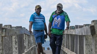 Paul Kabai and Pabai Pabai on boardwalk Boigu 
