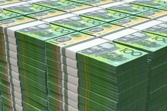 Piles of Australian dollar bank notes