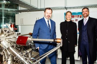 The Silicon Quantum Computing (SQC) team with the Minister for Industry and Science, Ed Husic (centre in navy suit) during the visit. To Mr Husic's left is UNSW Scientia Professor and lead researcher at Silicon Quantum Computing, Michelle Simmons. To Mr Husic's right is Dr Peter Yates, Chairman of the Australian Research Council Centre of Excellence for Quantum Computation and Communication Technology at UNSW.
