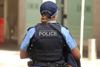 NSW Police officer with back to camera