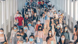 Bangkok City, Thailand : 03/12/2020 : Unidentified people, Crowd of Thai wearing face mask for health due to Coronavirus Disease or covid-19 and air pollution in mass transit in public. Rush hour.