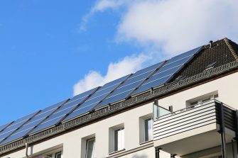 Solar panels on the roof of an apartment building in a residential district in Stockholm.