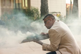 Ted Fields (Yuwaalaraay/Gamilaraay), Exhibition Opening Smoking Ceremony. Photo by Katherine Griffiths.