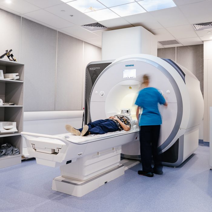 Patient on a the tray of a Siemens Magnetom Prisma MRI system in RINSW