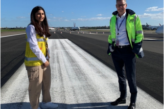 naugural SYD100 recipient Manmeet Kaur with Sydney Airport CEO Geoff Culbert (courtesy of The Australian)