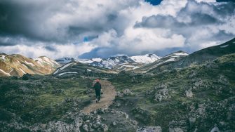 Man hiking through mountains