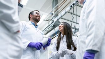 Students talk in laboratory