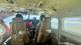 Aerial survey team in light aircraft