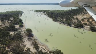 Large lake and shoreline from light aircraft