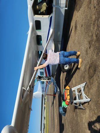 Crew preparing light aricraft