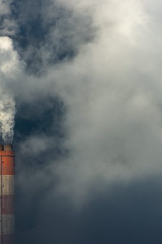 Smoke from a power plant drifts into the air