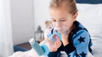 child with inhaler