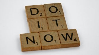 Do it now spelled out in Scrabble letters