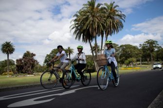 Students riding bikes in Centennial Park