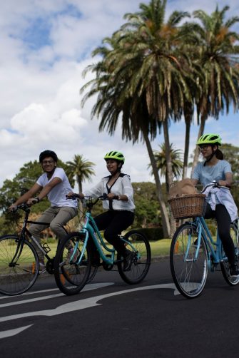 Students riding bikes in Centennial Park