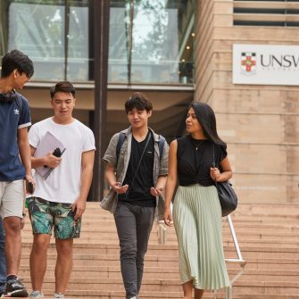 Photo of students walking down steps on campus at UNSW