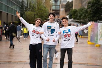 UNSW Accommodation people and events - Students representing, Goldstein, Baxter, and Basser Colleges with branded hoodies