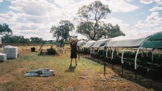 Lifting and filling new soil into the WAMS community garden beds in preparation for the 2022 winter season