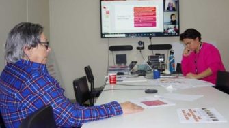 Peta and Virginia in a meeting room