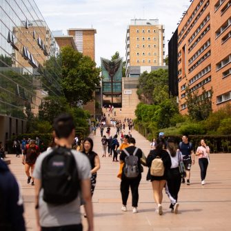 Students on Main Walkway, Scientia building in background