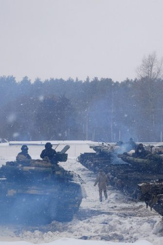 Tanks with tankers turn around and go to the training ground in Kharkiv, Ukraine.