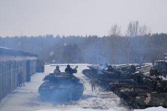 Tanks with tankers turn around and go to the training ground in Kharkiv, Ukraine.