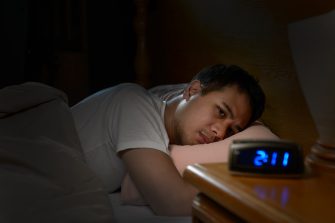 Peerson suffering from insomnia lying in bed