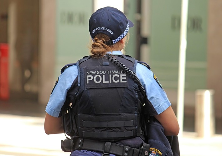 NSW Police officer with back to camera